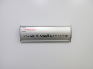 VSC60-7L Curved Office Name Plates are a changeable curved name plate sign for any office environment. These anodized aluminum name plates have a removable clear lens and they come in a curved or flat VS profiles.